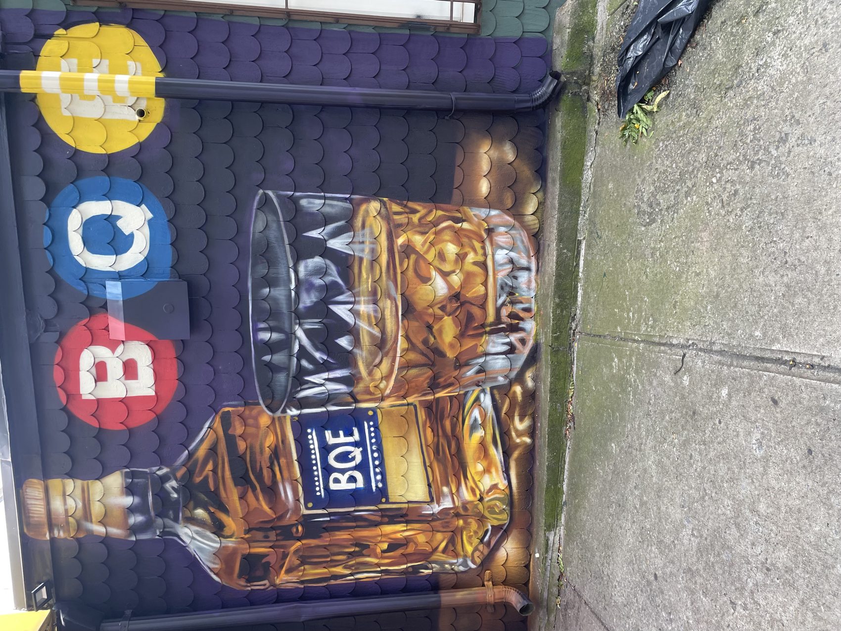 B-Q-E whiskey mural, bar