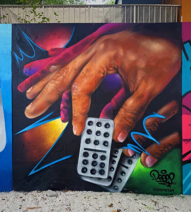 Community mural featuring dominoes, painted by Miami mural artist DREPS