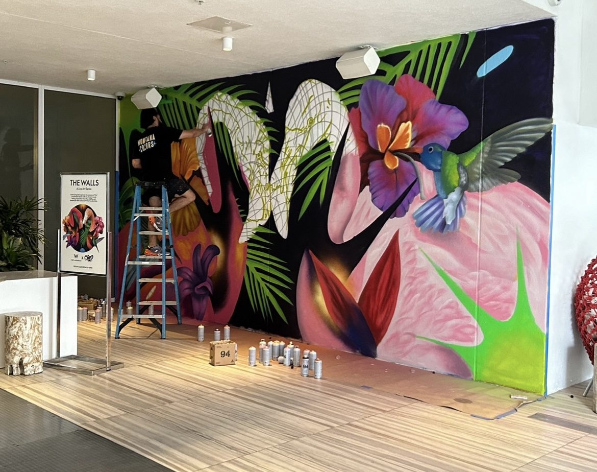 Live painting a flamingo mural, Miami event