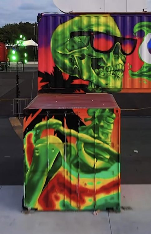 Neon skull mural, shipping container