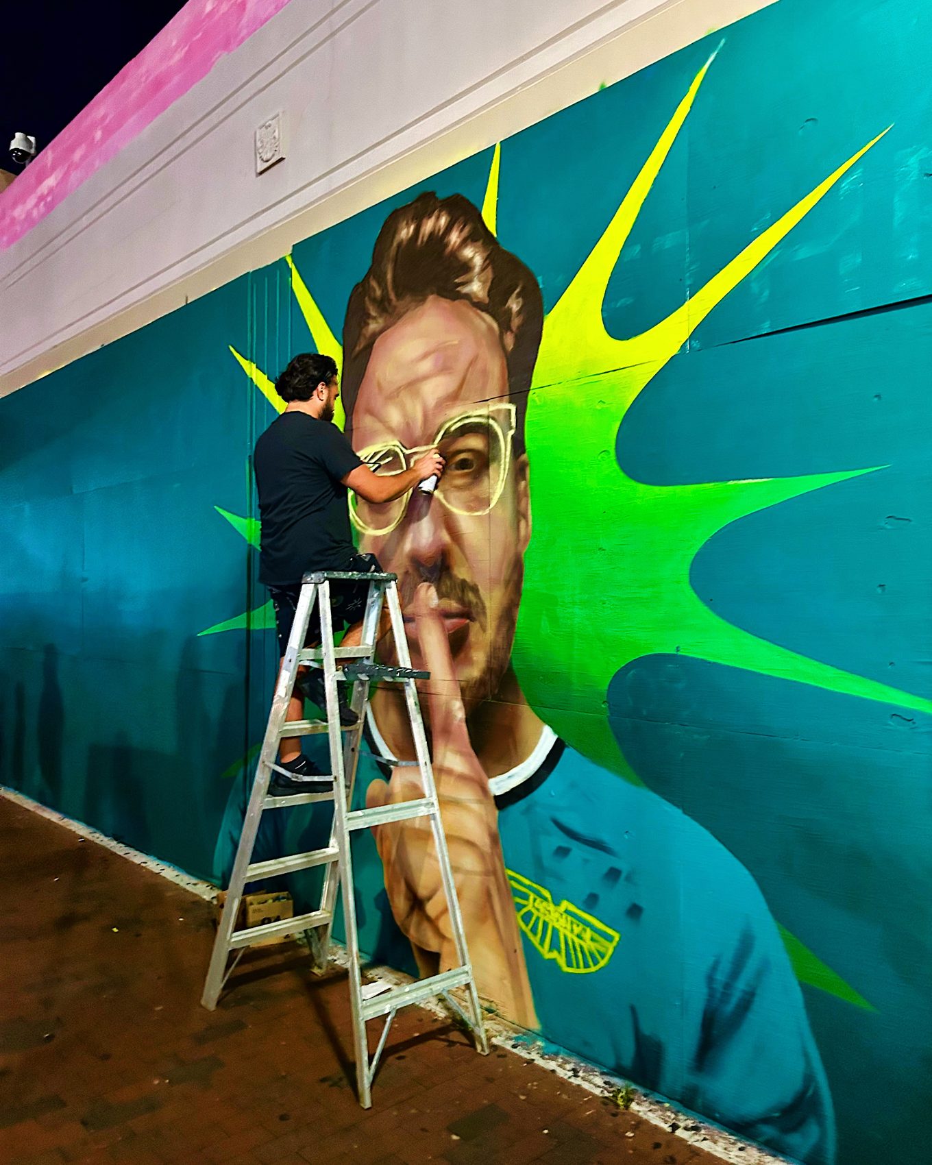 Live painting a portrait mural
